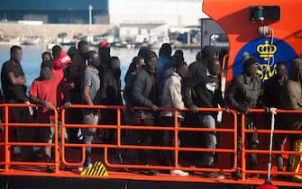 Migrants are seen standing on a rescue boat after their arrival at the Port of Malaga.
Spain’s Maritime Rescue service has rescued 58 migrants aboard a dinghy crossing the Alboran Sea and brought them to Malaga harbour, where they were assisted by the Spanish Red Cross. (Photo by Jesus Merida / SOPA Images/Sipa USA)