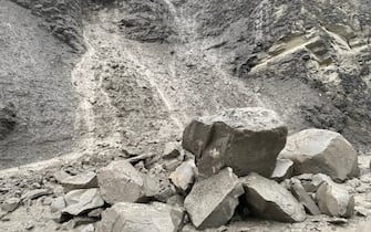 GARDINER, MT - JUNE 13:  In this handout photo provided by the National Park Service, large rocks pile up after a rockslide causing the hazardous conditions and road closure near the North Entrance Road in Yellowstone National PArk on June 13, 2022 in Gardiner, Montana. (Photo by the National Park Service via Getty Images)