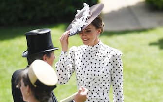 epa10018349 Britain's Catherine, Duchess of Cambridge (R) arrives on day four of Royal Ascot, in Ascot, Britain, 17 June 2022. Royal Ascot is Britain's most valuable horse race meeting and social event, running daily from 14 to 18 June 2022. Britain's Queen is not expected to attend the event due to on-going mobility issues.  EPA / NEIL HALL