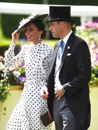 epa10018340 Britain's Prince William, Duke of Cambridge (R) and Catherine, Duchess of Cambridge arrive on day four of Royal Ascot, in Ascot, Britain, 17 June 2022. Royal Ascot is Britain's most valuable horse race meeting and social event, running daily from 14 to 18 June 2022. Britain's Queen is not expected to attend the event due to on-going mobility issues.  EPA/NEIL HALL