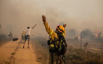Firefighters during the Sierra de la Culebra fire on June 18, 2022, in Zamora, Castilla y León (Spain). This fire, which remains at level 2 risk, has already burned nearly 20,000 hectares in the west of the province and has forced the railway traffic between Zamora-Sanabria Alta Velocidad and Madrid-Galicia to be cut off for at least all day Saturday. Photo by Emilio Fraile / Europa Press/ABACAPRESS.COM