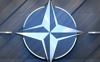 The NATO logo is pictured inside the new North Atlantic Council meeting room at the new NATO headquarters during a press tour of the facilities as the organization is moving from its old headquarters to the new building in Brussels on April 19, 2018. (Photo by Emmanuel DUNAND / AFP)        (Photo credit should read EMMANUEL DUNAND/AFP via Getty Images)