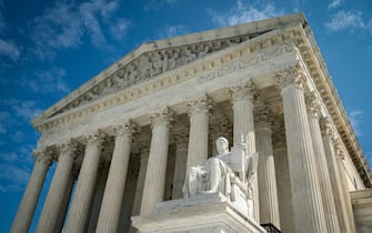 WASHINGTON, DC - SEPTEMBER 28: The Guardian or Authority of Law, created by sculptor James Earle Fraser, rests on the side of the U.S. Supreme Court on September 28, 2020 in Washington, DC. This week Seventh U.S. Circuit Court Judge Amy Coney Barrett, U.S. President Donald Trump's nominee to the Supreme Court, will begin meeting with Senators as she seeks to be confirmed before the presidential election. (Photo by Al Drago/Getty Images)