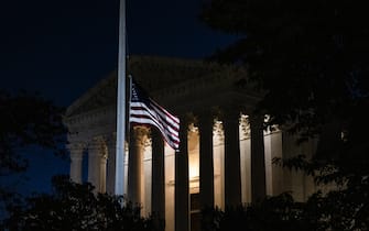 WASHINGTON, DC - SEPTEMBER 19: The American flag flies at half staff the morning after the death of Supreme Court Justice Ruth Bader Ginsburg in front of the US Supreme Court on September 19, 2020 in Washington, DC. Justice Ginsburg has died at age 87 after a battle with pancreatic cancer. (Photo by Samuel Corum/Getty Images)