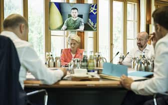 (left to right) German Chancellor Olaf Scholz, European Union Commission President Ursula von der Leyen, European Union Council President Charles Michel, and President of France Emmanuel Macron listen to Ukrainian President Volodymyr Zelensky on a video link at working session four , during the G7 summit in Schloss Elmau, in the Bavarian Alps, Germany. Picture date: Monday June 27, 2022.
