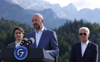 epa10035578 European Union Council President Charles Michel speaks at the 'Global Infrastructure' side event as (L-R) Canadian Prime Minister Justin Trudeau and U.S. President Joe Biden look on during the G7 summit at Schloss Elmau, near Garmisch-Partenkirchen, Germany, 26 June 2022. Leaders of the G7 group of nations are officially coming together under the motto: 'progress towards an equitable world' and will discuss global issues including war, climate change, hunger, poverty and health. Overshadowing this year's summit is the ongoing Russian war in Ukraine.  EPA/Sean Gallup / POOL