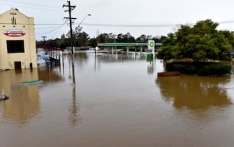 A general view shows flooded streets due to torrential rain in the Camden suburb of Sydney on July 3, 2022. - Thousands of Australians were ordered to evacuate their homes in Sydney on July 3 as torrential rain battered the country's largest city and floodwaters inundated its outskirts. (Photo by Muhammad FAROOQ / AFP) (Photo by MUHAMMAD FAROOQ/AFP via Getty Images)
