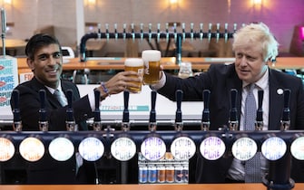 File photo dated 27/10/21 of Prime Minister Boris Johnson (right) with Chancellor of the Exchequer Rishi Sunak during a visit to Fourpure Brewery in Bermondsey, London. Prime Minister Boris Johnson and Chancellor Rishi Sunak have been told they will be fined as part of a police probe into allegations of lockdown parties held at Downing Street. Issue date: Tuesday April 12, 2022.