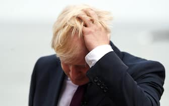 epa07823061 (FILE) - Britain's Prime Minister Boris Johnson reacts during a TV interview ahead of bilateral meetings as part of the G7 summit in Biarritz, France, 25 August 2019 (reissued 06 September 2019).  According to media reports, the British House of Lords approved the new law against a no-deal Brexit on 06 September 2019. EPA / NEIL HALL