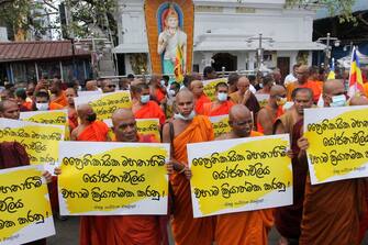 Sri Lanka's nationalist Buddhist monks demonstrate in Colombo on July 7, 2022, denouncing the resignation of Sri Lanka's President Gotabaya Rajapaksa over the country's ongoing economic crisis. (Photo by AFP) (Photo by -/AFP via Getty Images)