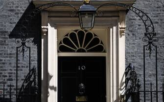 Number 10 Downing Street, a day after UK Prime Minister Boris Johnson announced he would resign, in London, UK, on ​​Friday, July 8, 2022. The ruling Conservative Party is urgently drawing up plans for an accelerated contest to choose UK Prime Minister Boris Johnson's successor by the end of the summer, rather than allowing the extended three-month swan song officials at No. 10 had floated earlier in the day.  Photographer: Hollie Adams / Bloomberg