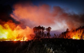 A photo shows a forest fire in Louchats, south-western France, on July 17, 2022. (Photo by THIBAUD MORITZ / AFP) (Photo by THIBAUD MORITZ / AFP via Getty Images)