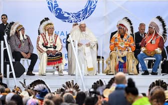 Pope Francis speaks to members of the Indigenous community at Muskwa Park in Maskwacis, Alberta, Canada, on July 25, 2022. - Pope Francis will make a historic personal apology Monday to Indigenous survivors of child abuse committed over decades at Catholic-run institutions in Canada, at the start of a week-long visit he has described as a "penitential journey." (Photo by Patrick T. FALLON / AFP) (Photo by PATRICK T. FALLON/AFP via Getty Images)
