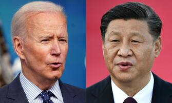 (COMBO) This combination of file pictures created on June 08, 2021, shows US President Joe Biden (L) speaking at the Eisenhower Executive Office Building in Washington, DC on June 2, 2021; and Chinese President Xi Jinping speaking on arrival at Macau's international airport on December 18, 2019. - President Joe Biden and Chinese counterpart Xi Jinping spoke by phone on July 28, 2022, on mounting tensions over Taiwan, a festering trade dispute and their bid to keep the superpower rivalry in check. The White House said the phone call started at 8:33 am in Washington (1233 GMT). A statement would be issued after the call ended, a spokesman said. While this was Biden's fifth talk with Xi since becoming president a year and a half ago, it's getting hard to mask deepening mistrust between the two countries. (Photo by MANDEL NGAN and Anthony WALLACE / AFP)