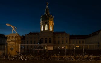 28 July 2022, Berlin: Charlottenburg Palace is in the dark in the evening. This is the country's way of saving energy - one of the consequences of the war in Ukraine. Photo: Paul Zinken/dpa (Photo by Paul Zinken/picture alliance via Getty Images)