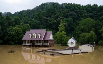 JACKSON, KY - JULY 29:  A house is seen almost completely submerged off of the Bert T Combs Mountain Parkway on July 29, 2022 in Breathitt County, Kentucky. At least 16 people have been killed and hundreds had to be rescued amid flooding from heavy rainfall. 
 (Photo by Michael Swensen/Getty Images)