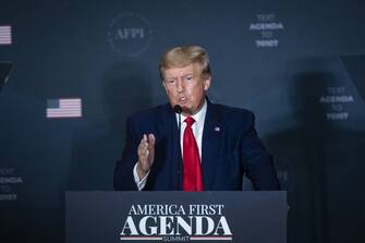 1242129722 Former US President Donald Trump speaks during the America First Policy Institute's America First Agenda Summit in Washington, D.C., US, on Tuesday, July 26, 2022. Trumps remarks come on the heels of a House hearing that portrayed him standing by indifferently, even vindictively, for hours as a mob of his supporters battled police and chased lawmakers through the halls of the Capitol. Photographer: Al Drago/Bloomberg via Getty Images