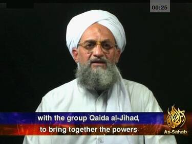 -, -:  QATAR AND INTERNET OUT A frame grab from a videotape aired 05 August 2006 on the Qatar-based Al-Jazeera television network shows Al-Qaeda second-in-command Ayman Al-Zawahiri at an undisclosed place and time. Al-Zawahiri today announced that Egypt's Jamaa Islamiya militant group had formally joined the global terror network. AFP PHOTO/AL-JAZEERA  (Photo credit should read -/AFP via Getty Images)