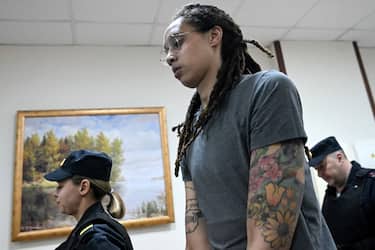 US Women National Basketball Association's (NBA) basketball player Brittney Griner, who was detained at Moscow's Sheremetyevo airport and later charged with illegal possession of cannabis, leaves the courtroom before the court's final decision in Khimki outside Moscow, on August 4, 2022. - Russian prosecutors requested that US basketball star Brittney Griner be sentenced to nine and a half years in prison on drug smuggling charges. Her hearing comes with tensions soaring between Moscow and Washington over Russia's military intervention in Ukraine that has sparked international condemnation and a litany of Western sanctions. (Photo by Kirill KUDRYAVTSEV / POOL / AFP) (Photo by KIRILL KUDRYAVTSEV/POOL/AFP via Getty Images)