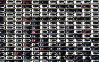 TOPSHOT - An aerial view shows imported cars, including Tesla electric vehicles, parked at Taipei Port in New Taipei City on November 11, 2021. (Photo by Sam Yeh / AFP) (Photo by SAM YEH/AFP via Getty Images)