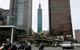 epa09252444 The Taipei 101 (C) tower is seen in Taipei, Taiwan, 07 June 2021. The Taiwan government extended the national  COVID-19 alert level 3 to 28 June, a day after the US pledged to donate 750,000 doses of COVID-19 vaccine to Taiwan.  EPA/RITCHIE B. TONGO