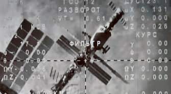 The International Space Station (ISS) is seen on the monitor after the Soyuz MS-20 space craft undocked from the ISS, starting the landing of the International space crew including Japanese space tourists Yusaku Maezawa and his assistant Yozo Hirano, and Russian cosmonaut Alexander Misurkin, at Mission Control Center in Korolyov, outside Moscow, early on December 20, 2021. - A Japanese billionaire is to return to Earth December 20 after spending 12 days on the International Space Station, where he made videos about performing mundane tasks in space including brushing teeth and going to the bathroom. Online fashion tycoon Yusaku Maezawa and his assistant Yozo Hirano, who will be shepherded home by Russian cosmonaut Alexander Misurkin, are set to parachute on Kazakhstan's steppe at 0313 GMT Monday. Their journey marked Russia's return to space tourism after a decade-long pause that saw the rise of competition from the United States. (Photo by Alexander NEMENOV / AFP) (Photo by ALEXANDER NEMENOV/AFP via Getty Images)