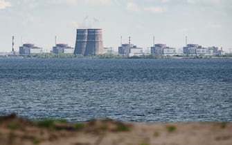 A general view shows the Zaporizhzhia nuclear power plant, situated in the Russian-controlled area of ​​Enerhodar, seen from Nikopol in April 27, 2022. (Photo by Ed JONES / AFP) (Photo by ED JONES / AFP via Getty Images)