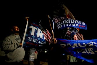 PALM BEACH, FL - AUGUST 08: Supporters of former President Donald Trump rally near his home at Mar-A-Lago on August 8, 2022 in Palm Beach, Florida. The FBI raided the home to retrieve classified White House documents. (Photo by Eva Marie Uzcategui/Getty Images)