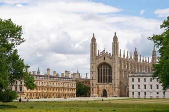 1241032273 Gardeners David Kay and Lou Singfield tend to the wildflower meadow which has burst into flower at King's College in Cambridge. Picture date: Wednesday June 1, 2022. (Photo by Joe Giddens/PA Images via Getty Images)