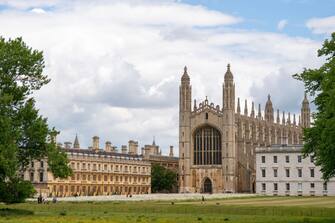 Gardeners David Kay and Lou Singfield tend to the wildflower meadow which has burst into flower at King's College in Cambridge. Picture date: Wednesday June 1, 2022. (Photo by Joe Giddens/PA Images via Getty Images)