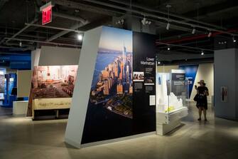 NEW YORK, NY - JUNE 13:  A woman takes a photograph during the inaugural tour of the new 9/11 Tribute Museum in Lower Manhattan, June 13, 2017 in New York City. The new 9/11 Tribute Museum is officially opening today in an expanded location. The museum shares the personal stories of those directly impacted by the September 11, 2001 terrorist attacks on the World Trade Center. (Photo by Drew Angerer/Getty Images)