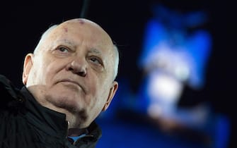 epa04483103 Former Soviet leader Mikhail Gorbachev attends the celebrations during the citizens' festival at BrandenburgÃ?Â Gate inÃ?Â Berlin, Germany, 09 November 2014. Germany on 07 November launched its celebrations marking the 25th anniversary of the fall of the Berlin Wall when it switched on a 15-kilometre-long so-called 'Border of Lights 2014' in the nation's capital that illuminates where the notorious former Berlin Wall stood. Numerous events mark the 25th anniversary of the fall of the BerlinÃ?Â Wall.  EPA/BERND VON JUTRCZENKA