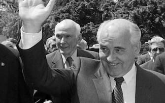 Photograph shows former Soviet president Mikhail Gorbachev (centre), waving, as he walks with Librarian of Congress James H. Billington (right) on the U.S. Capitol grounds across the street from the Library of Congress. Mikhail Sergeyevich Gorbachev (born 2 March 1931) is a Russian and former Soviet politician. The eighth and final leader of the Soviet Union, he was the General Secretary of the Communist Party of the Soviet Union from 1985 until 1991. (Photo by: Universal History Archive/Universal Images Group via Getty Images)