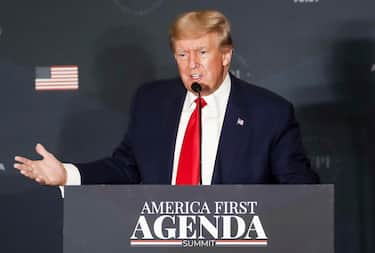epa10092882 Former US President Donald J. Trump delivers remarks during the America First Policy Institute s America First Agenda Summit in Washington, DC, USA, 26 July 2022. The speech is former President Trump s first appearance in Washington since leaving office.  EPA/SHAWN THEW