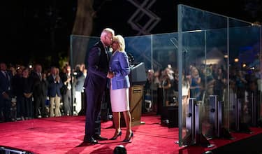 epa10153861 US President Joe Biden (L) and First Lady Dr. Jill Biden (R) share a moment before his remarks on the 'battle for the Soul of the Nation' at Independence National Historical Park, in Philadelphia, Pennsylvania, USA, 01 September 2022.  EPA/Doug Mills / POOL