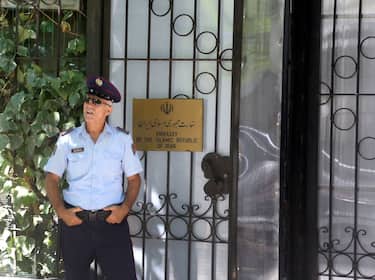 A police officer stands guard outside the Embassy of the Islamic Republic of Iran in Tirana on September 7, 2022. - Albania cut diplomatic ties with Iran with immediate effect and asked all embassy staff to leave the country within 24 hours after Albanian Prime Minister Edi Rama announced that Iran was behind a cyber-attack against the small European nation earlier in July. Since 2013, Albania hosts around 3,000 Iranian exiles of the opposition group MEK (Peoples Mujahedin of Iran). (Photo by Gent SHKULLAKU / AFP) (Photo by GENT SHKULLAKU/AFP via Getty Images)