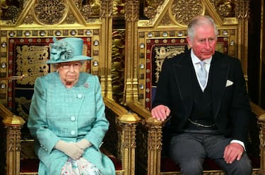 LONDON, ENGLAND - DECEMBER 19: Queen Elizabeth II and Prince Charles, Prince of Wales are seated for the state opening of parliament at the Houses of Parliament on December 19, 2019 in London, England. In the second Queen's speech in two months, Queen Elizabeth II will unveil the majority Conservative government's legislative programme to Members of Parliament and Peers in The House of Lords.(Photo by Aaron Chown - WPA Pool/Getty Images)