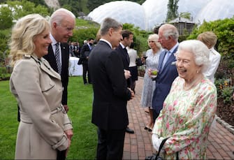epa09263414 A handout photo made available by 10 Donwing Street shows Britain's Queen Elizabeth II (R) shares a light moment with US President Joe Biden (2-L( and his wife Jill (L) during a dinner reception at the G7 summit in St Austell, Cornwall, Britain 11 June 2021. Britain is hosting the G7 summit in Cornwall in from 11 to 13 June 2021.  EPA/ANDREW PARSONS/DOWNING STREET / HANDOUT This image is for Editorial use purposes only. The Image can not be used for advertising or commercial use. The Image can not be altered in any form. Downing street handout. HANDOUT EDITORIAL USE ONLY/NO SALES