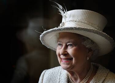MERTHYR, WALES - APRIL 26:  Queen Elizabeth II smiles as she visits Cyfarthfa High School and Castle on April 26, 2012 in Merthyr, Wales. The Queen and Duke of Edinburgh are on a two day visit to Wales as part of their Diamond Jubilee tour of the country.  (Photo by Chris Jackson WPA - Pool/Getty Images)