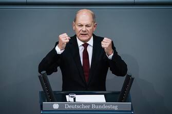 epa10166464 German Chancellor Olaf Scholz gestures as he speaks during a session of the German Parliament Bundestag in Berlin, Germany, 07 September 2022. Main topic of the four hour general debate during the budget week at the Bundestag is the Chancellery and the Chancellor.  EPA/CLEMENS BILAN