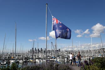 AUCKLAND, NEW ZEALAND - SEPTEMBER 09: Flags at the Westhaven Marina fly at half mast on September 09, 2022 in Auckland, New Zealand. Queen Elizabeth II died at Balmoral Castle in Scotland aged 96 on September 8, 2022, and is survived by her four children, Charles, Prince of Wales, Anne, Princess Royal, Andrew, Duke Of York and Edward, Duke of Wessex. Elizabeth Alexandra Mary Windsor was born in Bruton Street, Mayfair, London on 21 April 1926. She married Prince Philip in 1947 and acceded the throne of the United Kingdom and Commonwealth on 6 February 1952 after the death of her Father, King George VI. Queen Elizabeth II was the United Kingdom's longest-serving monarch. (Photo by Phil Walter/Getty Images)