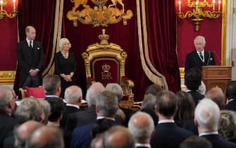 TOPSHOT - Britain's Prince William, Prince of Wales (L) and Britain's Camilla, Queen Consort (2L) listen as Britain's King Charles III speaks during a meeting of the Accession Council in the Thrown Room inside St James's Palace in London on September 10, 2022, to proclaim him as the new King. - Britain's Charles III was officially proclaimed King in a ceremony on Saturday, a day after he vowed in his first speech to mourning subjects that he would emulate his "darling mama", Queen Elizabeth II who died on September 8. (Photo by Jonathan Brady / POOL / AFP) (Photo by JONATHAN BRADY/POOL/AFP via Getty Images)