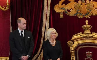 TOPSHOT - Britain's Prince William, Prince of Wales (L) and Britain's Camilla, Queen Consort (2L) listen as Britain's King Charles III speaks during a meeting of the Accession Council in the Thrown Room inside St James's Palace in London on September 10, 2022, to proclaim him as the new King. - Britain's Charles III was officially proclaimed King in a ceremony on Saturday, a day after he vowed in his first speech to mourning subjects that he would emulate his "darling mama", Queen Elizabeth II who died on September 8. (Photo by Jonathan Brady / POOL / AFP) (Photo by JONATHAN BRADY/POOL/AFP via Getty Images)