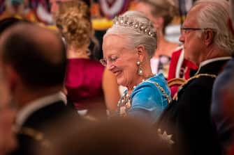 epa10179217 Danish Queen Margrethe listens while Danish Prime Minister Mette Frederiksen gives her speech at a gala banquet at Christiansborg Palace in Copenhagen, Denmark, 11 September 2022. The banquet was held to mark the 50th anniversary of Danish Queen Margrethe II's accession to the throne.  EPA/Ida Marie Odgaard  DENMARK OUT