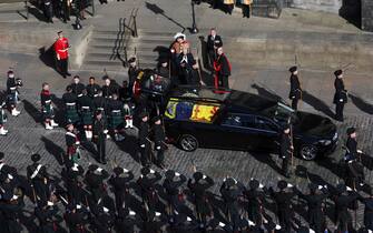 68787290 Royal guards wait to carry Queen Elizabeth II's coffin as it arrives at St Giles' Cathedral, Edinburgh for a Service of Prayer and Reflection for her life. Picture date: Monday September 12, 2022.