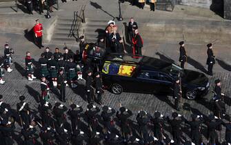 Royal guards wait to carry Queen Elizabeth II's coffin as it arrives at St Giles' Cathedral, Edinburgh for a Service of Prayer and Reflection for her life. Picture date: Monday September 12, 2022.