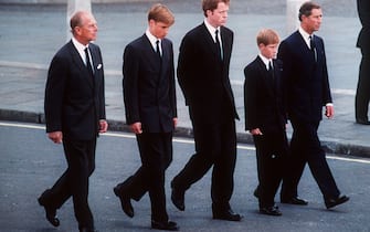 The Duke of Edinburgh, Prince William, Earl Spencer, Prince Harry and the Prince of Wales follow the coffin of Diana, Princess of Wales in September 1997. (Photo by Anwar Hussein / WireImage)