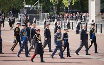 King Charles III, the Princess Royal, the Duke of York, the Earl of Wessex, the Prince of Wales, the Duke of Sussex and Peter Phillips, follow behind the coffin of Queen Elizabeth II, during the ceremonial procession from Buckingham Palace to Westminster Hall, London, where it will lie in state ahead of her funeral on Monday. Picture date: Wednesday September 14, 2022.