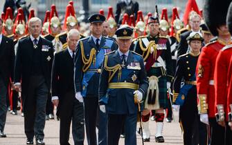 The Prince of Wales, King Charles III and the Princess Royal walks behind the coffin of Queen Elizabeth II, during the ceremonial procession from Buckingham Palace to Westminster Hall, London, where it will lie in state ahead of her funeral on Monday. Picture date: Wednesday September 14, 2022.