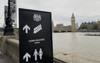 Signage on the South Bank, London, for members of the public to wait in the queue to view Queen Elizabeth II lying in state ahead of her funeral on Monday.  Picture date: Wednesday September 14, 2022.